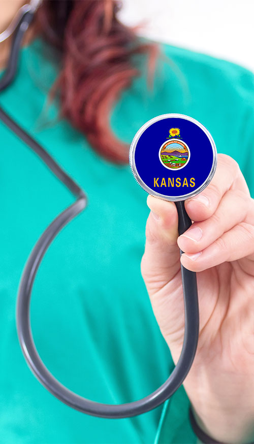 female provider with stethoscope bearing the Kansas state seal