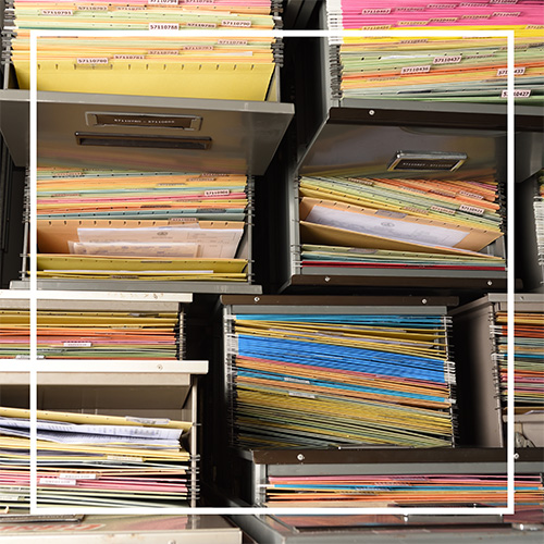 old-medical-records_500x500px stacks of medical records
